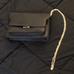 Black purse w/ gold chain